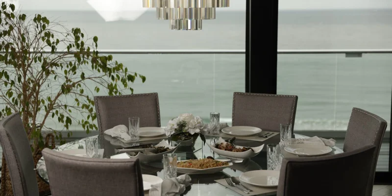 Dining setup with seating and a table.