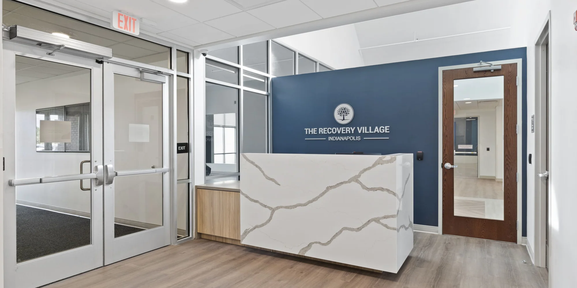  The front reception area with a blue accent wall.