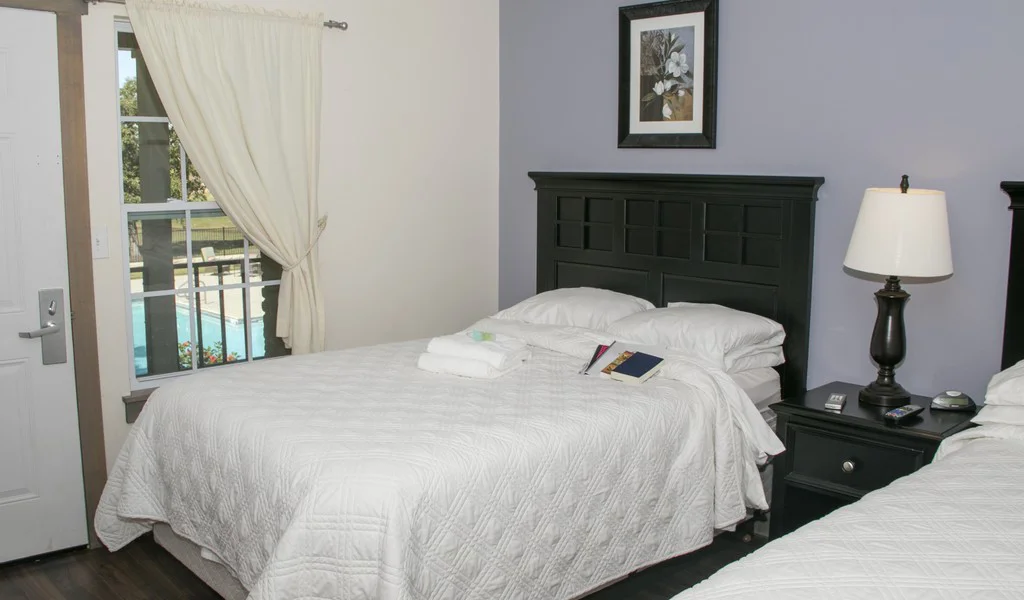 Shared bedroom with two beds.