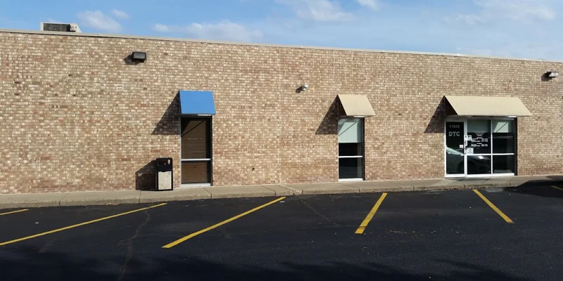 Facility exterior with entrance and accessible parking.