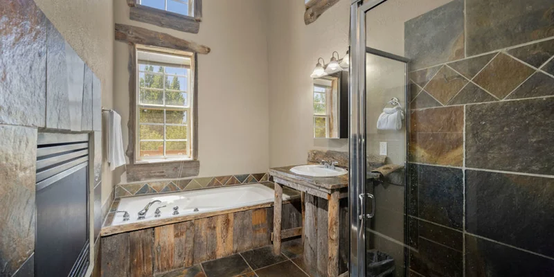 Bathroom with a tub and vanity.