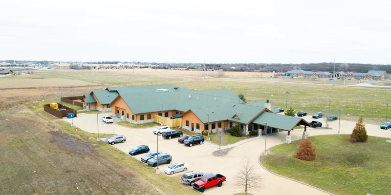 Aerial view of the rehab facility surrounded by open land.