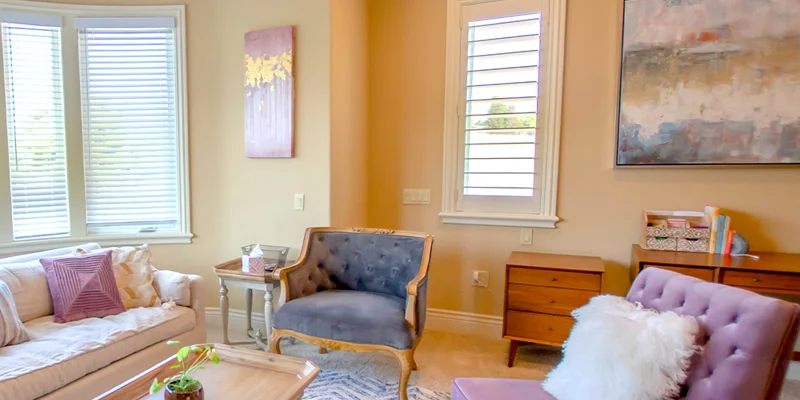 Lounge area with chairs and a table.