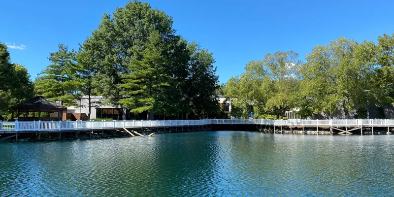 Lakeside view with a boardwalk and gazebo
