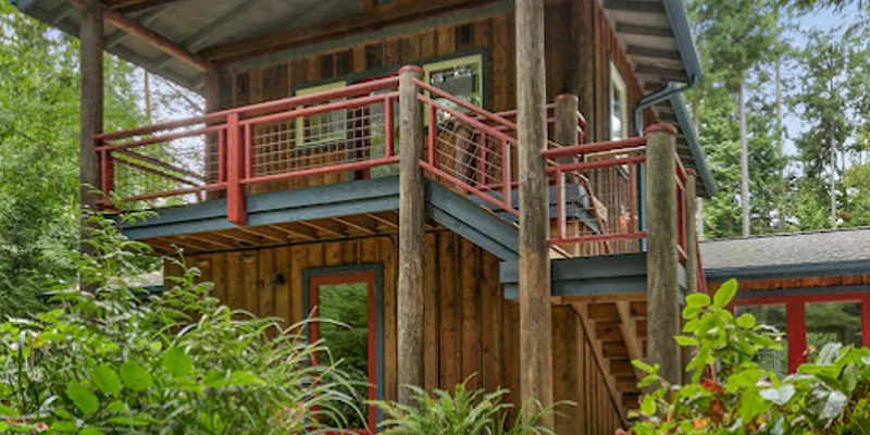 Facility exterior with entrance and stairs.