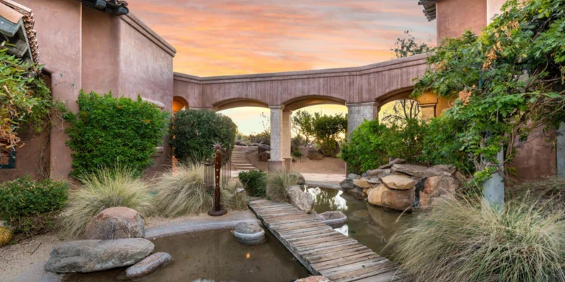 Small pond with a wooden bridge.