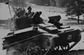 The Sultan of Muscat, Said bin Taimur, watches British troop maneuvers at Aldershot, England, in 1938 prior to the war.