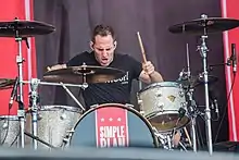 Comeau performing with Simple Plan at Rock im Park 2017