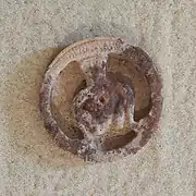 Squatting figure