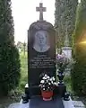 A monument to priest Michael Datsyshyn in the village Duliby.