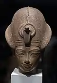 Head of Amenhotep III; 1390–1352&nbsp;BC; quartzite; 24 × 20&nbsp;cm, 9.8&nbsp;kg; British Museum