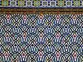 Zellij with darj-wa-ktaf motifs in the upper facade of the gates