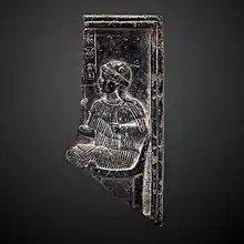 Fragment of a bas-relief with goddess Ninsun; 2255–2040 BC; steatite; height: 14&nbsp;cm; Louvre