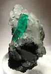 Muzo emerald on calcite5.3&nbsp;cm ×&nbsp;3&nbsp;cm ×&nbsp;3&nbsp;cm (2.1&nbsp;in ×&nbsp;1.2&nbsp;in ×&nbsp;1.2&nbsp;in)