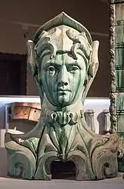 Bust decorating the balconies of 29 avenue Rapp, Paris, by Alexandre Bigot and Jean-Baptiste Larrivé&nbsp;[fr] (1901)