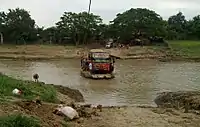 Raft used to bridge vehicles at Citarum River, Karawang, West Java, Indonesia