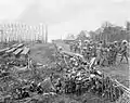Klingalese coolies constructing a bridge at a tobacco plantation in the Dutch East-Indies (Indonesia), 1898.