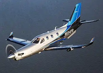 Image 10SOCATA TBMPhotograph credit: Michael MainieroThe SOCATA TBM (now Daher TBM) is a family of high-performance single-engine turboprop business and utility light aircraft manufactured by Daher. This SOCATA TBM 900 was photographed in flight during the 2015 EAA AirVenture Oshkosh airshow in the U.S. state of Wisconsin. The aircraft features a Pratt & Whitney Canada PT6A-64 engine, and a five-blade carbon-fiber propeller, which increases performance and decreases cabin noise. In a passenger configuration, the pressurized cabin is typically fitted with highly finished interiors, featuring luxury materials such as leather and wood veneers.More selected pictures