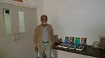An author at a book release (Luis Assis Correia).
