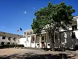 The chancery of the Polish Embassy in Beijing seen from in front of the gates
