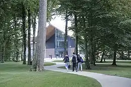 Students walking towards LaFerme, the newest academic building of Beauvais campus