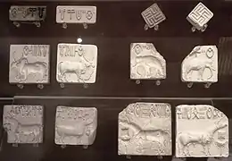 Seals with Indus script and impressions; 2500-2000 BC; steatite; various sizes, mostly c.3&nbsp;cm; British Museum (London)