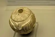 Inscription on the mace head, possibly dedicated to Enannatum II: "For Ningirsu of E-ninnu, the workman of Enannatum, ruler of Lagash, Barakisumun, the sukkal, dedicated this for the life of Enannatum, his Master."