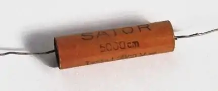 Wound metallized paper capacitor from the early 1930s in hardpaper case, capacitance value specified in "cm" in the cgs system; 5,000&nbsp;cm corresponds to 0.0056&nbsp;µF.