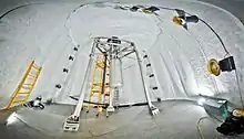 The Large Underground Xenon experiment installed 1,480 m (4,850 ft) underground inside the water tank shield.
