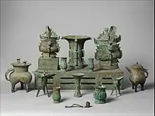 Altar set; late 11th century BC; bronze; overall (table): height: 18.1&nbsp;cm (71⁄8 in.), width: 46.4&nbsp;cm (181⁄4 in.), depth: 89.9&nbsp;cm (353⁄8 in.); Metropolitan Museum of Art (New York City, U.S.)