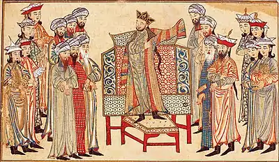 Sultan Mahmud of Ghazni&nbsp;receiving a richly decorated robe of honor from the caliph&nbsp;al-Qadir&nbsp;in 1000. Miniature from the Rashid al-Din's&nbsp;Jami' al-tawarikh