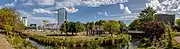 panoramic view of empty land, with an artwork in the foreground