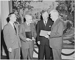 Secretary of Defense Marshall with President Truman and Princeton University President Harold W. Dodds at the Library of Congress. 17 May 1950.