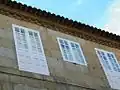 Renaissance decoration shaped like balls on the upper part of one of the façades