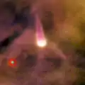 Bright proplyd 170-249 in the Orion Nebula, from Hubble Space Telescope. The upward tail is a jet of dust and gas blowing away from the excited proplyd