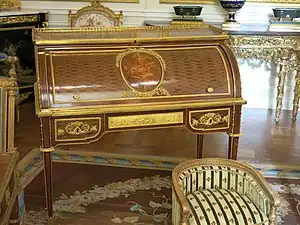 Louis XVI style roll-top desk of Marie-Antoinette; by Jean-Henri Riesener; 1784; oak and pine frame, sycamore, amaranth and rosewood veneer, bronze gilt; 103.6 x 113.4&nbsp;cm; Louvre