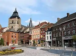 The Saint-Vincent collegiate church&nbsp;[fr] (10th century) and the square on the "Place Verte"