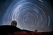 Stars rotate around the southern celestial pole during a night at La Silla
