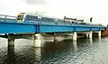 A train crossing the bridge.