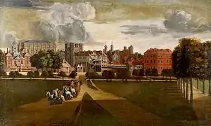 The Palace of Whitehall by Hendrick Danckerts, c. 1675, viewed from St. James's Park looking east.  The four-towered building left of centre is the palace gatehouse, the "Holbein Gate".