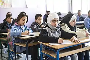 Boys and girls in a classroom