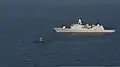 HNLMS Evertsen (F805), right, and the attack submarine HNLMS Dolfijn (S808) conduct maritime operations in the Baltic Sea during BALTOPS 2013