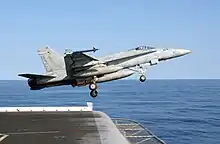 NF-414 launches from the Kitty Hawk on Jan 31, 2003 in the Sea of Japan.