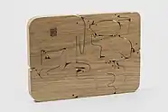 Puzzle en madera maciza de roble (https://www.danesemilano.com/it/productDetails?idProduct=60)