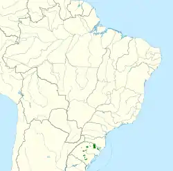 Distribución geográfica del loro de anteojos rojos.