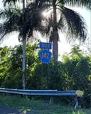 Identificador de ruta en dirección sur en el barrio Espinosa, Dorado