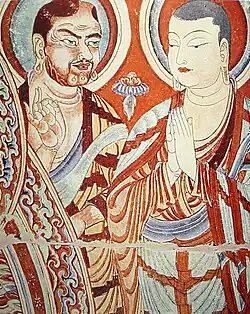 Fresco chino del siglo&nbsp;IX representando a monjes budistas; el de la izquierda con rasgos tocarios. Grutas Bezeklik o Grutas de los Mil Budas, ubicadas en Qian Fo Dong, cuenca del Tarim, Sinkiang, en la región autónoma de los uigures (China).