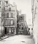 La rue du Marché aux fleurs en la Ile de la Cité, antes de Haussmann, hoy plaza Louis-Lépine