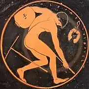 Muchacho joven con un disco en la palestra. Cerca de él, una selección para preparar el aterrizaje en tierra para el salto de longitud y un par de halteras para mantener el equilibrio durante el salto. Tondo de un kílix ático de figuras rojas, 510–500&nbsp;a.&nbsp;C., Museo del Louvre, París.