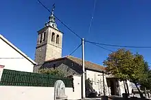 Fuente e Iglesia de San Juan Evangelista